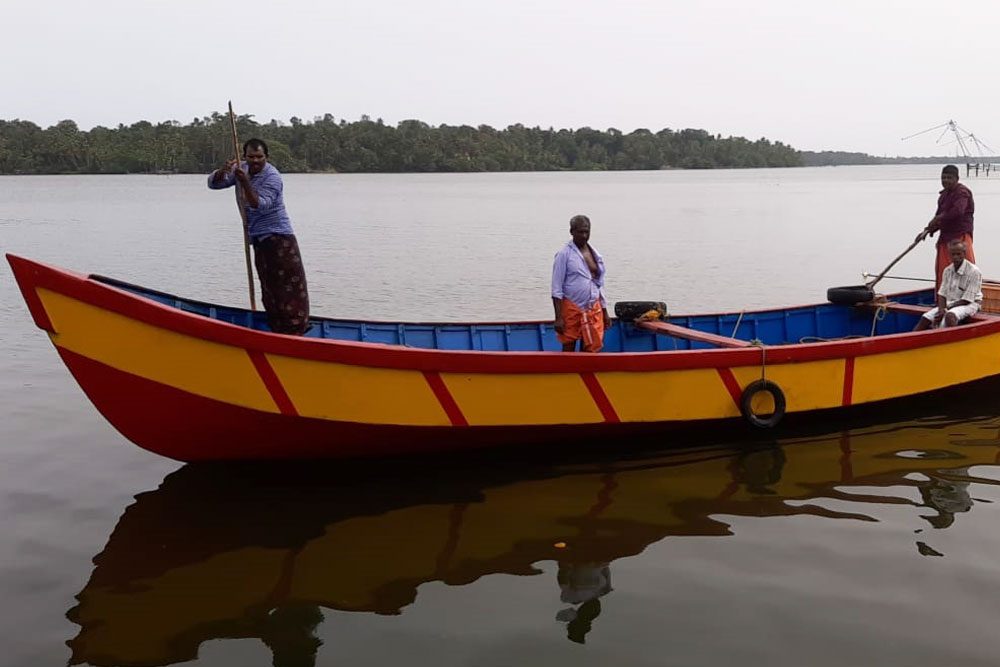 Boat on the backwaters near Aamees Paradise